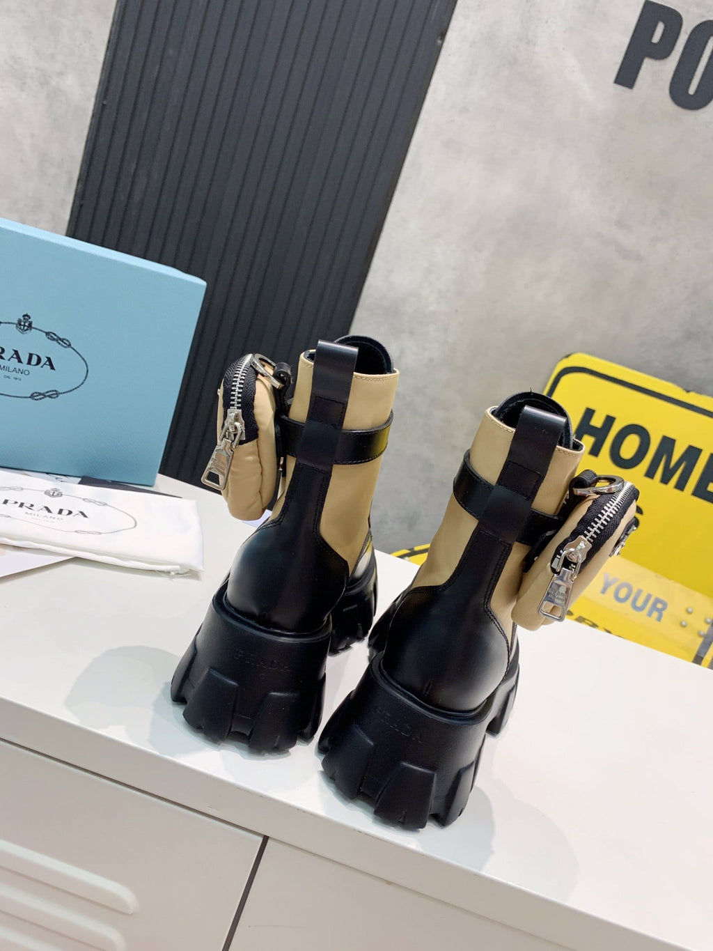 PRADA 25S MONOLITH BRUSHED AND RE NYLON BOOTS WITH POUCH BLACK AND MUTED OLIVE