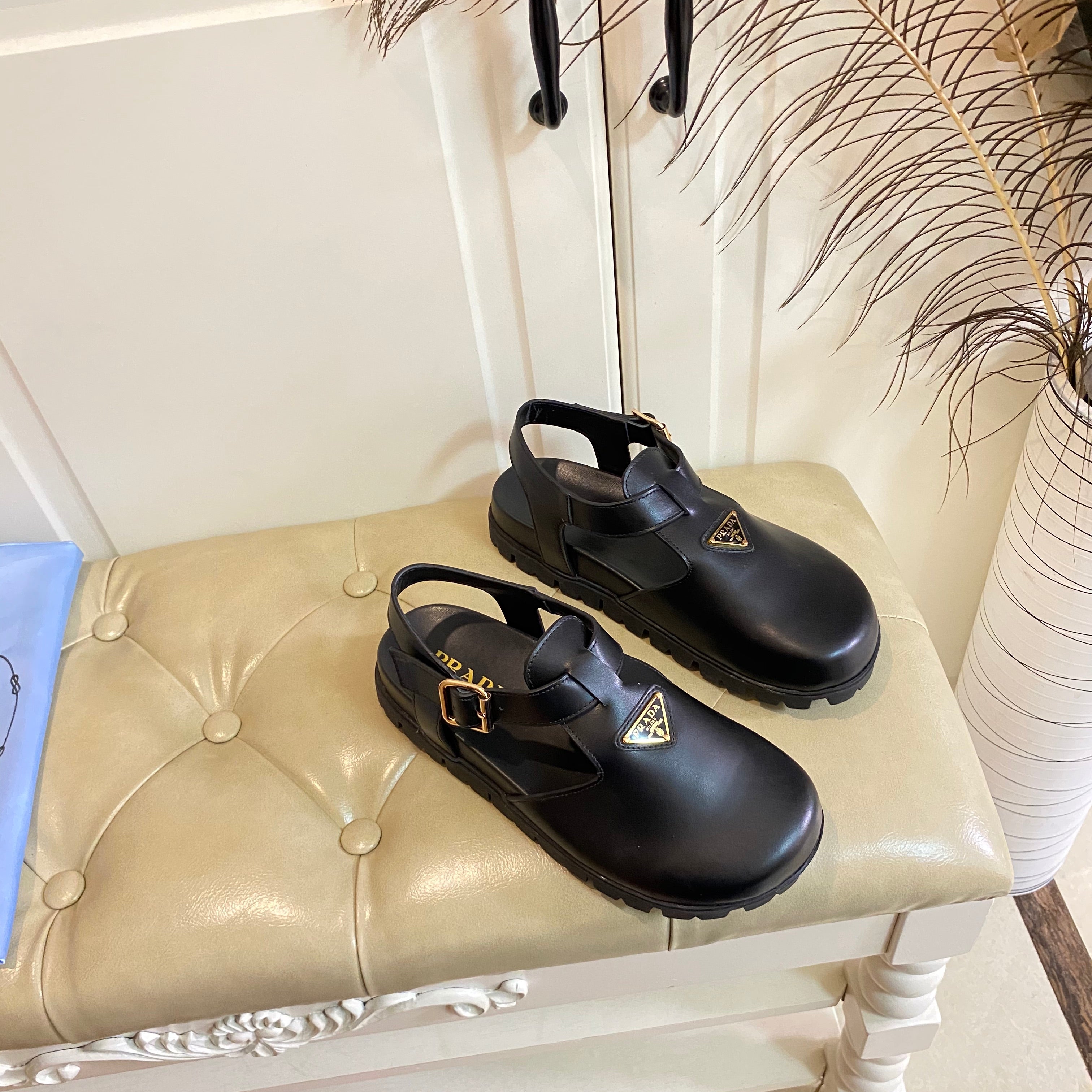 PRADA RUBBER SOLE SANLS IN BLACK SMOOTH LAMBSKIN