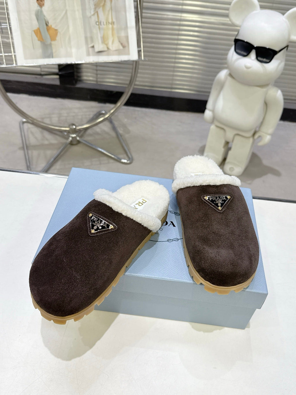 PRADA 25S FUR-LINED MULES IN RK BROWN SUEDE