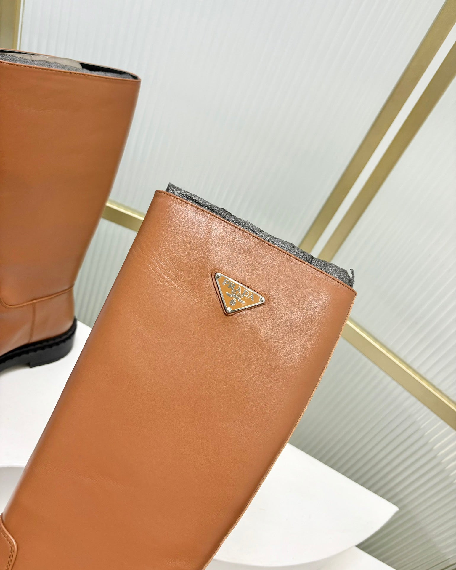 PRADA KNEE BOOTS WITH TRIANGLE LOGO IN CAMEL CALFSKIN
