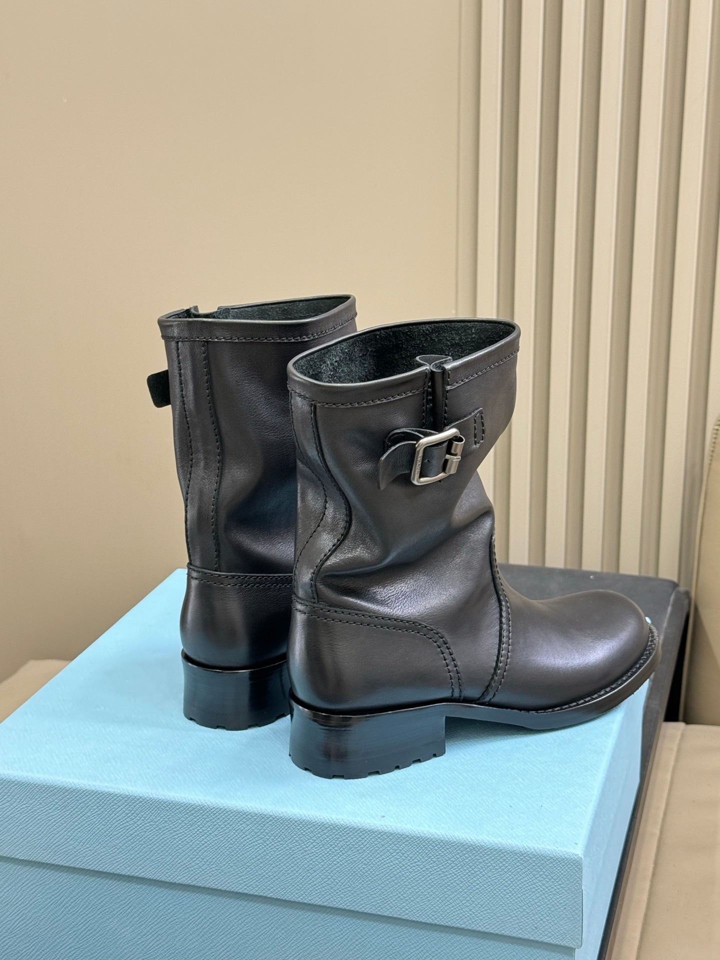 PRADA 25S ANKLE BOOTS IN RK BLACK BROWN CALFSKIN