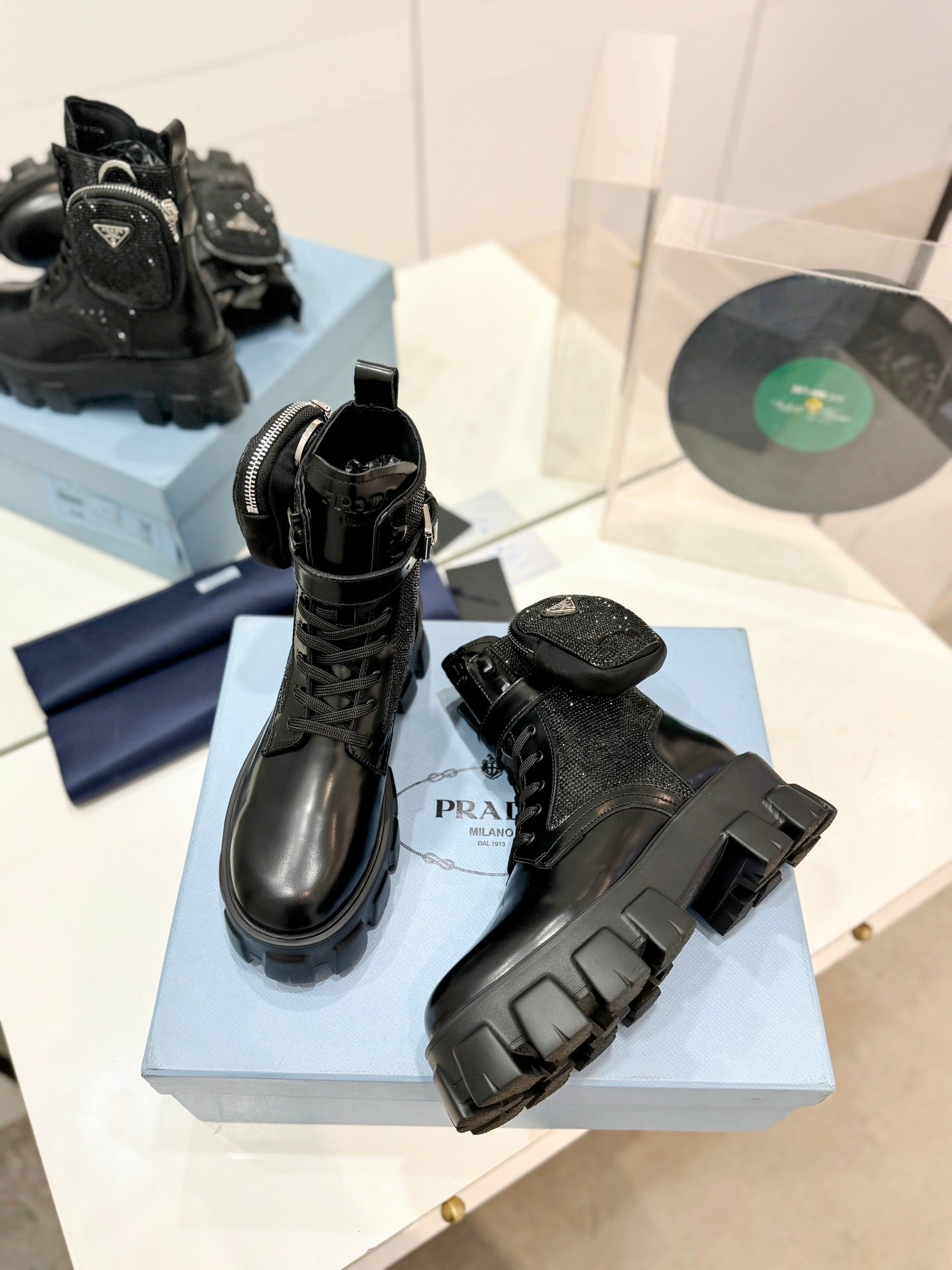 PRADA MONOLITH BRUSHED AND RE-NYLON BOOTS WITH POUCH TWINKLE BLACK CALFSKIN