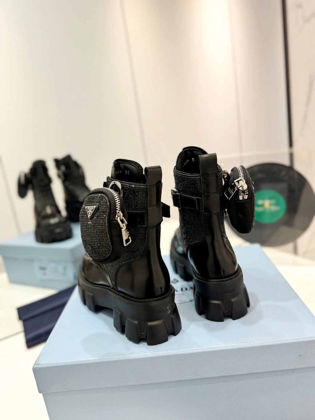 PRADA MONOLITH BRUSHED AND RE-NYLON BOOTS WITH POUCH TWINKLE BLACK CALFSKIN